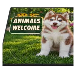 Close detail of the Animals Welcome badge and the puppy on the printed pile